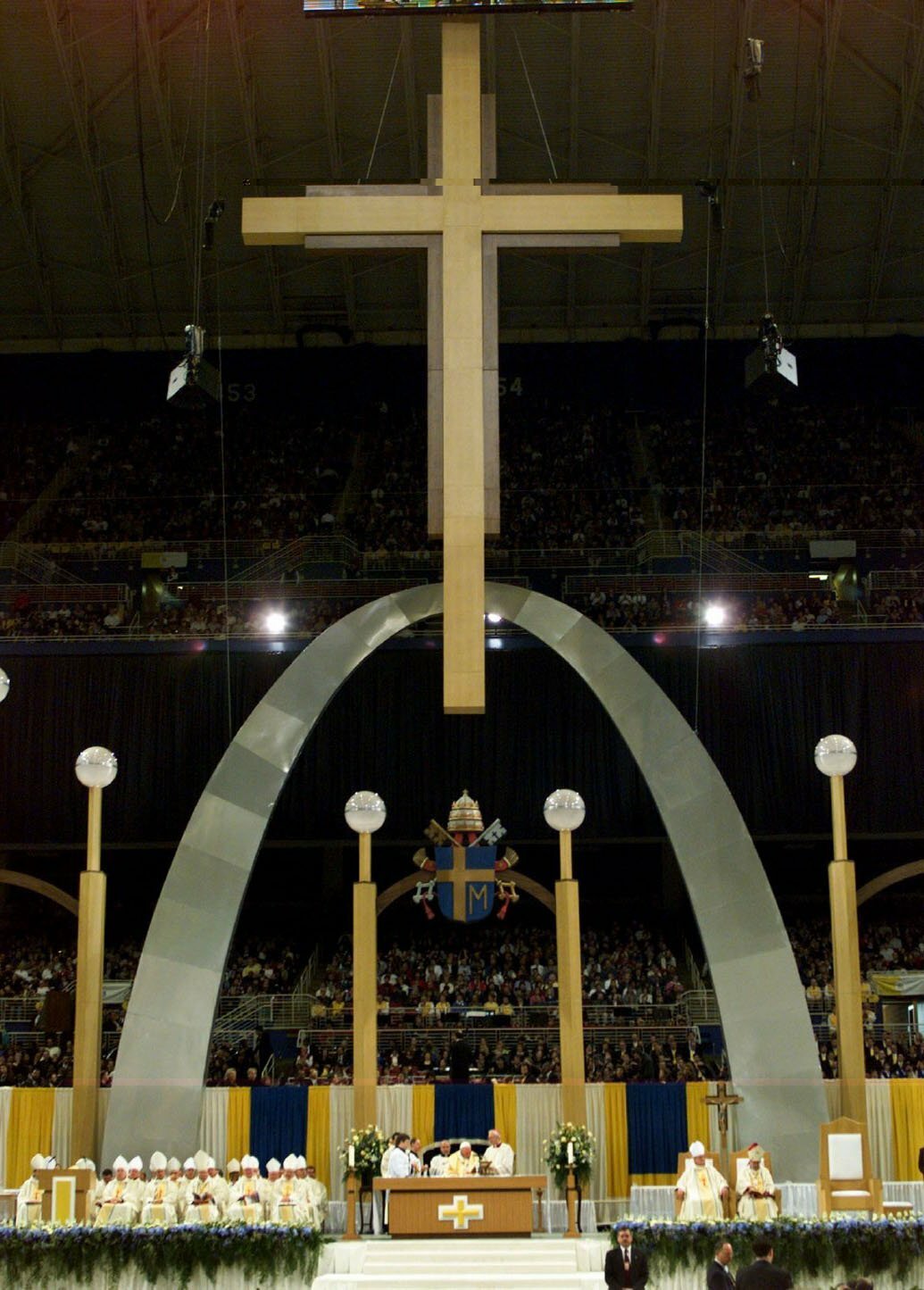 Pope John Paul II celebrates Mass Jan. 27, 1999, in the Trans World Dome under an arch built to resemble the Gateway Arch in St. Louis.